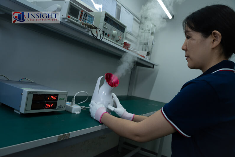 Inspector doing functional checks on facial steamer