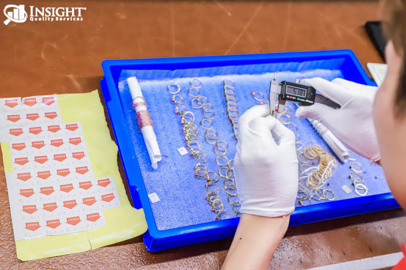 Inspector checking jewelry