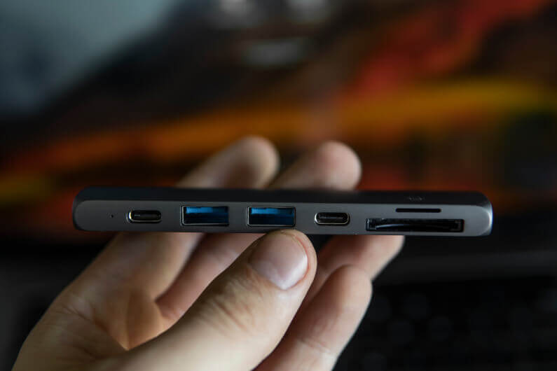 Hand holding USB hub