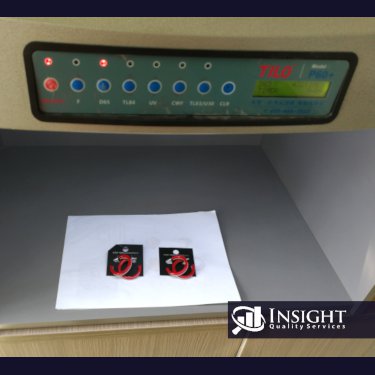 Pieces of jewelry placed inside a light box