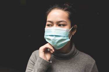 Woman wearing surgical mask