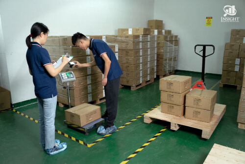 Two Insight inspectors weighing cartons